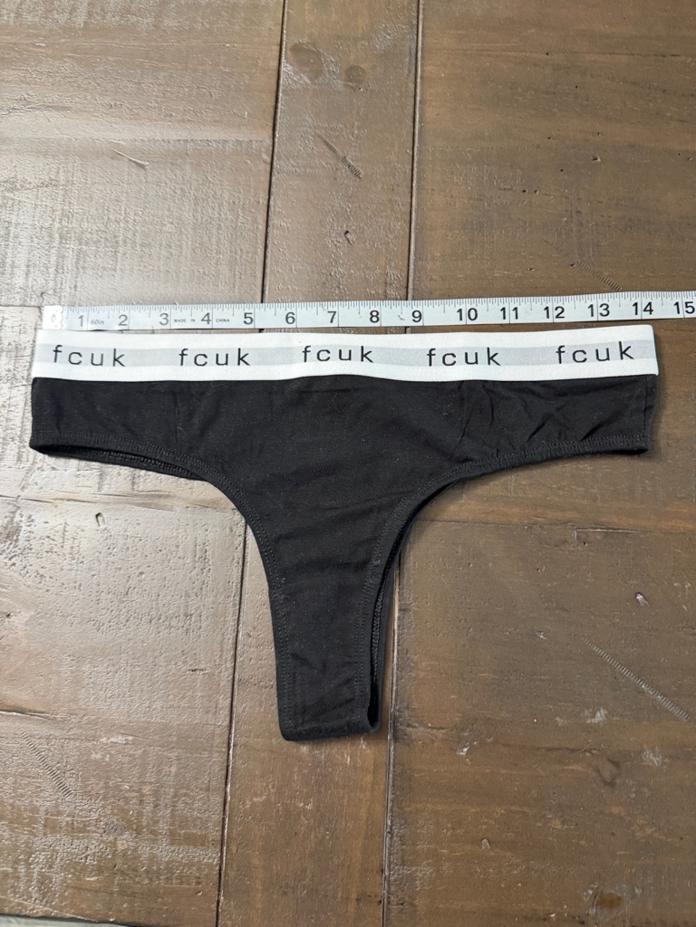 Pack of 7 thongs by French Connection.